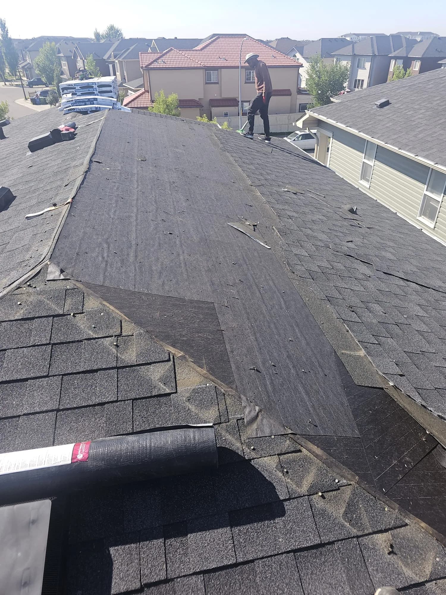 7 Lucky Enterprises crew on a Calgary roofing project